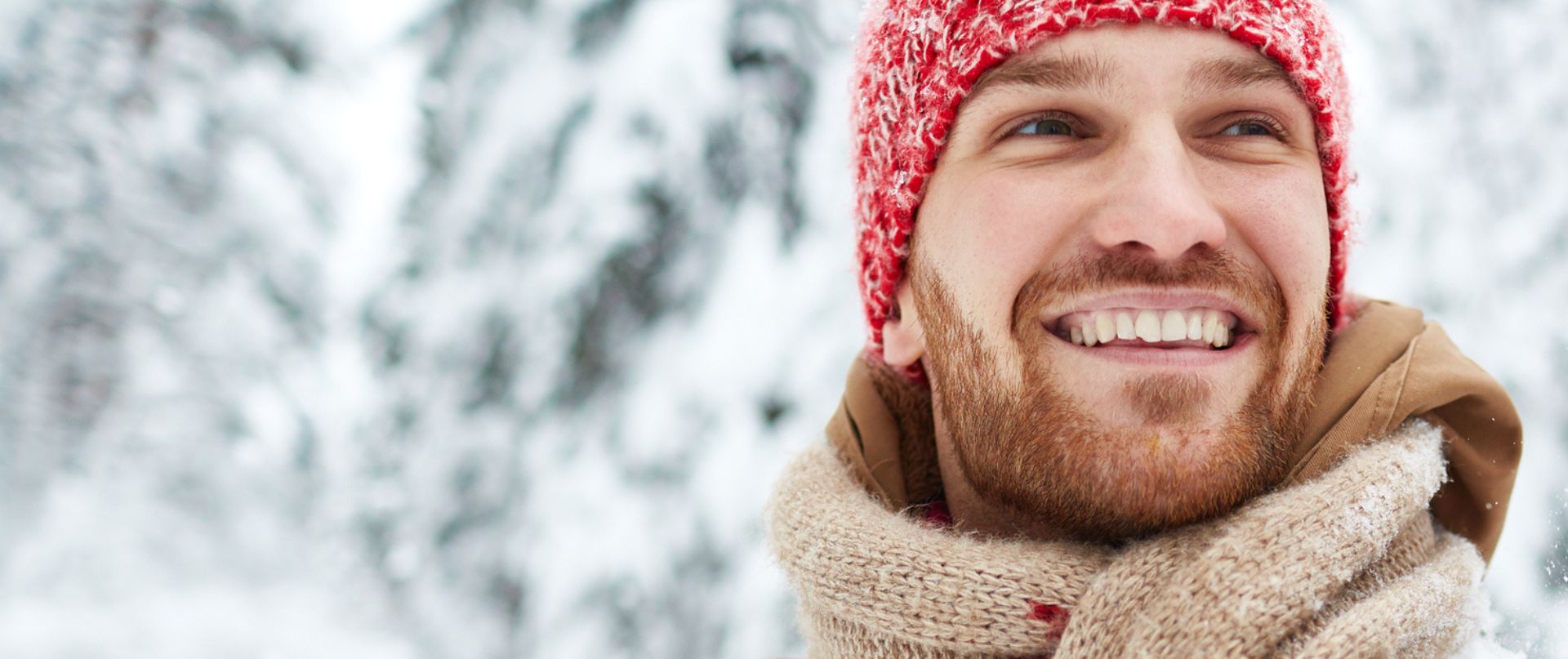 man smiling outdoors