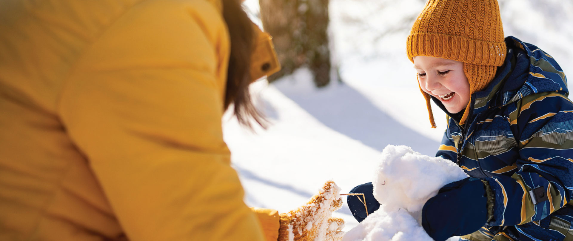 child playing in snow