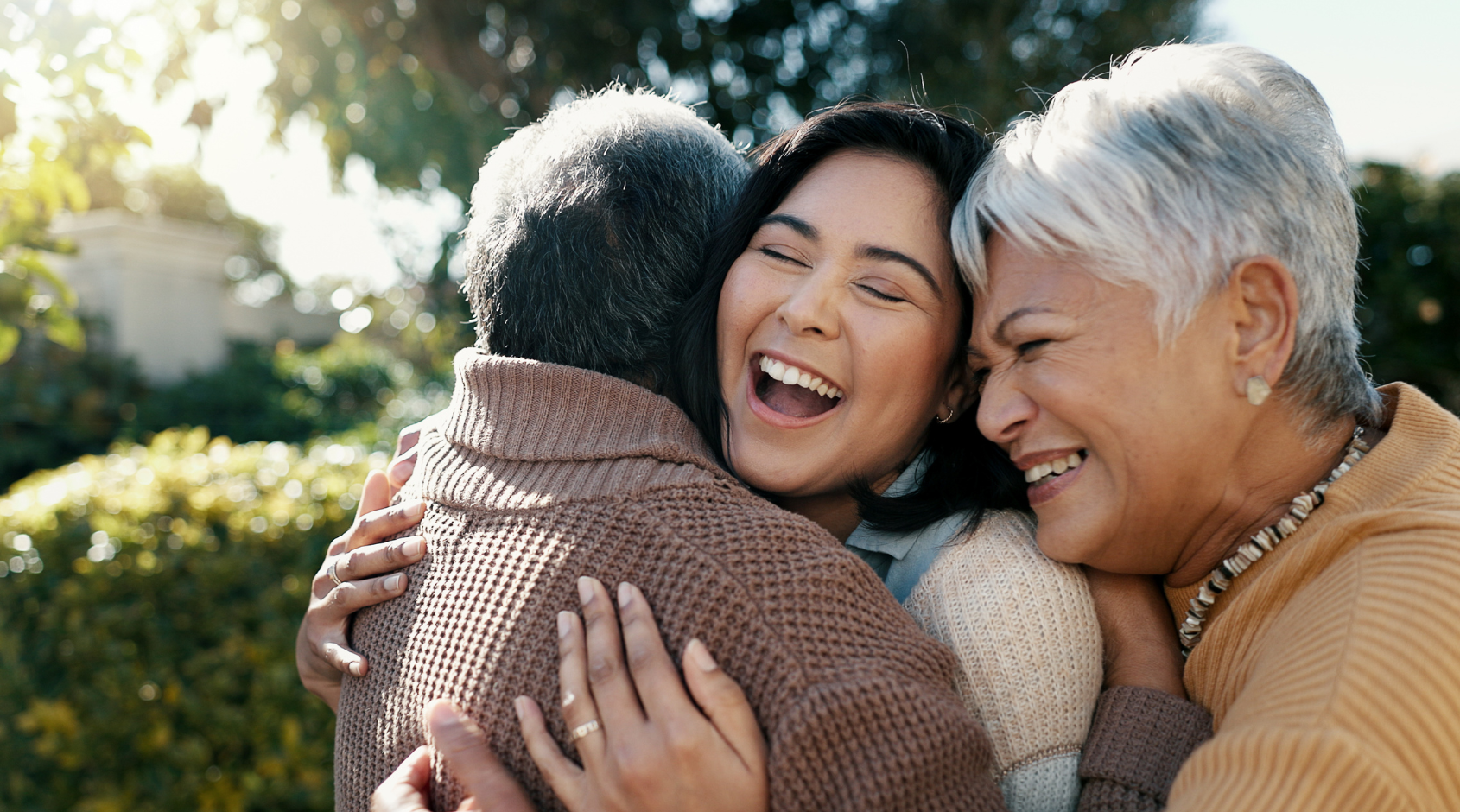 three women hugging