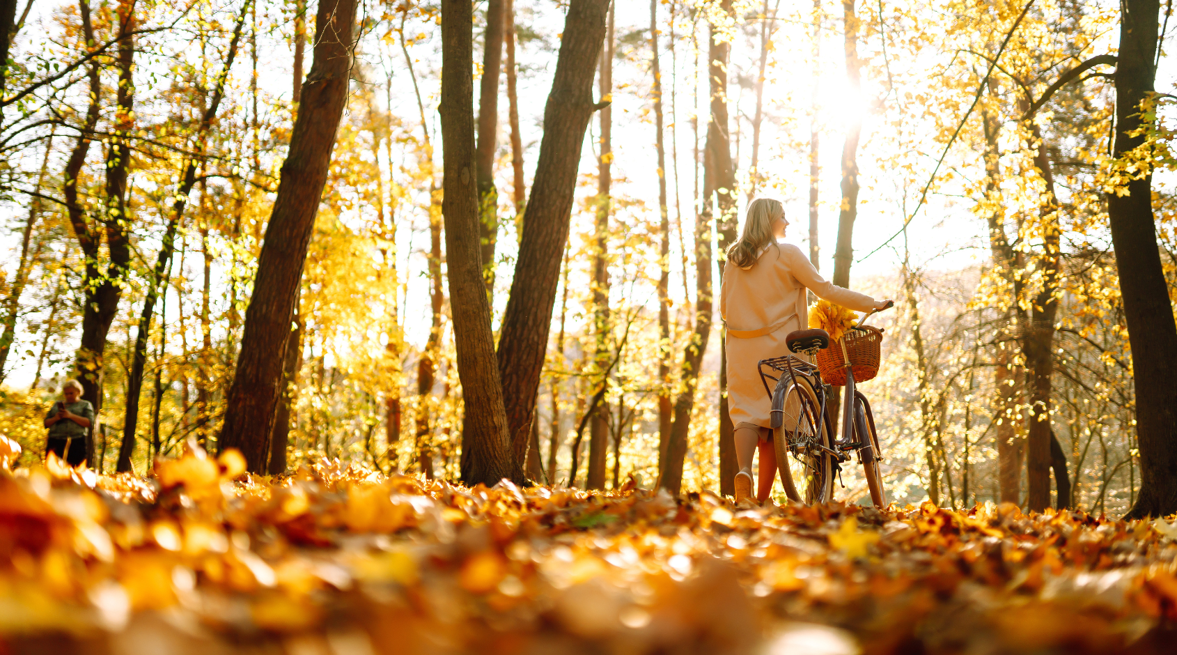 woman walking with bike