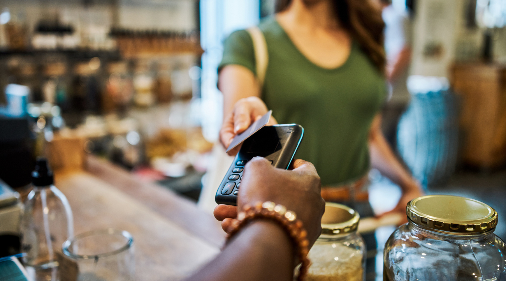 woman using contactless payment