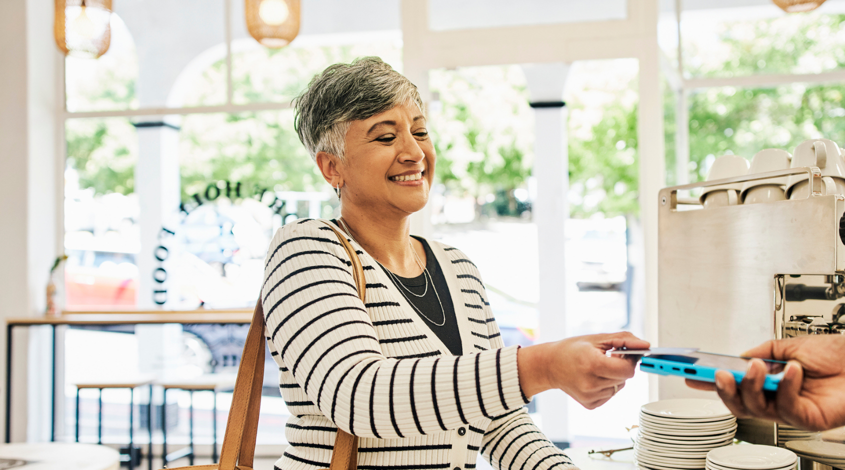 woman paying with credit card