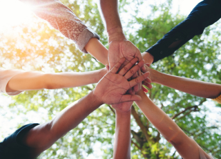 hands meeting together