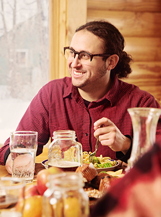 Man eating food in restaurant