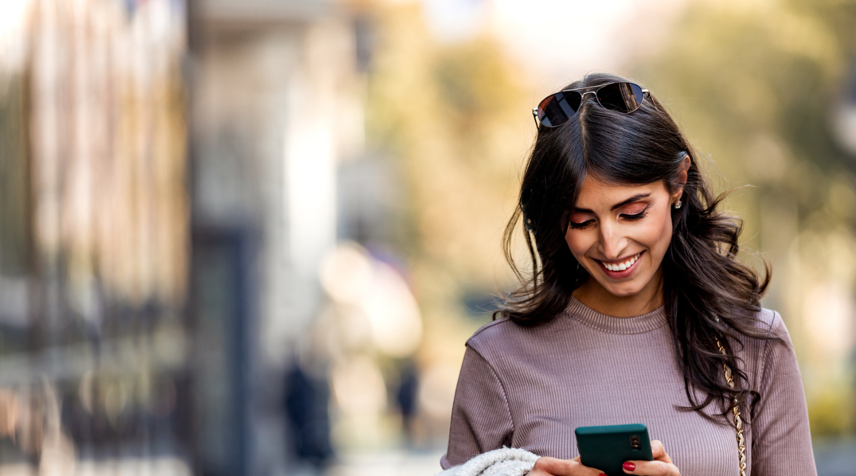 woman looking at cellphone